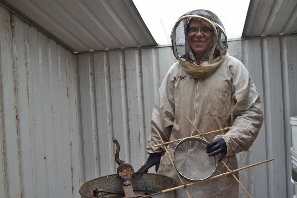 Brentan with the simple tools of trade: a spinner and sieve.